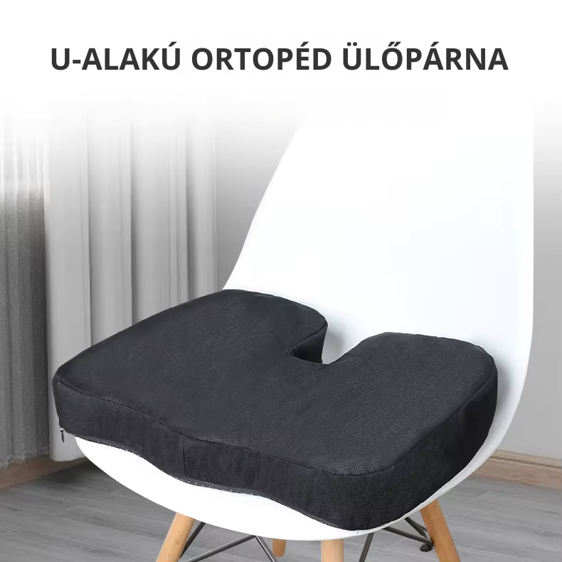 U-alakú ortopéd ülőpárna fekete huzattal fehér széken, ergonomikus kialakítás